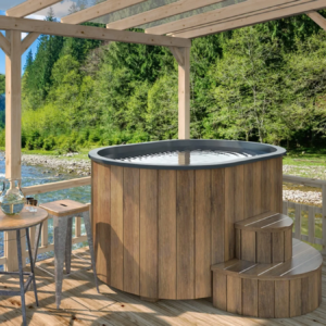 Cold Tub OFURO with natural thermowood cladding and grey insert in a riverside outdoor setting